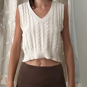white sweater vest